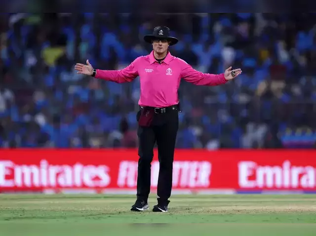 Umpire Signals a Wide Ball